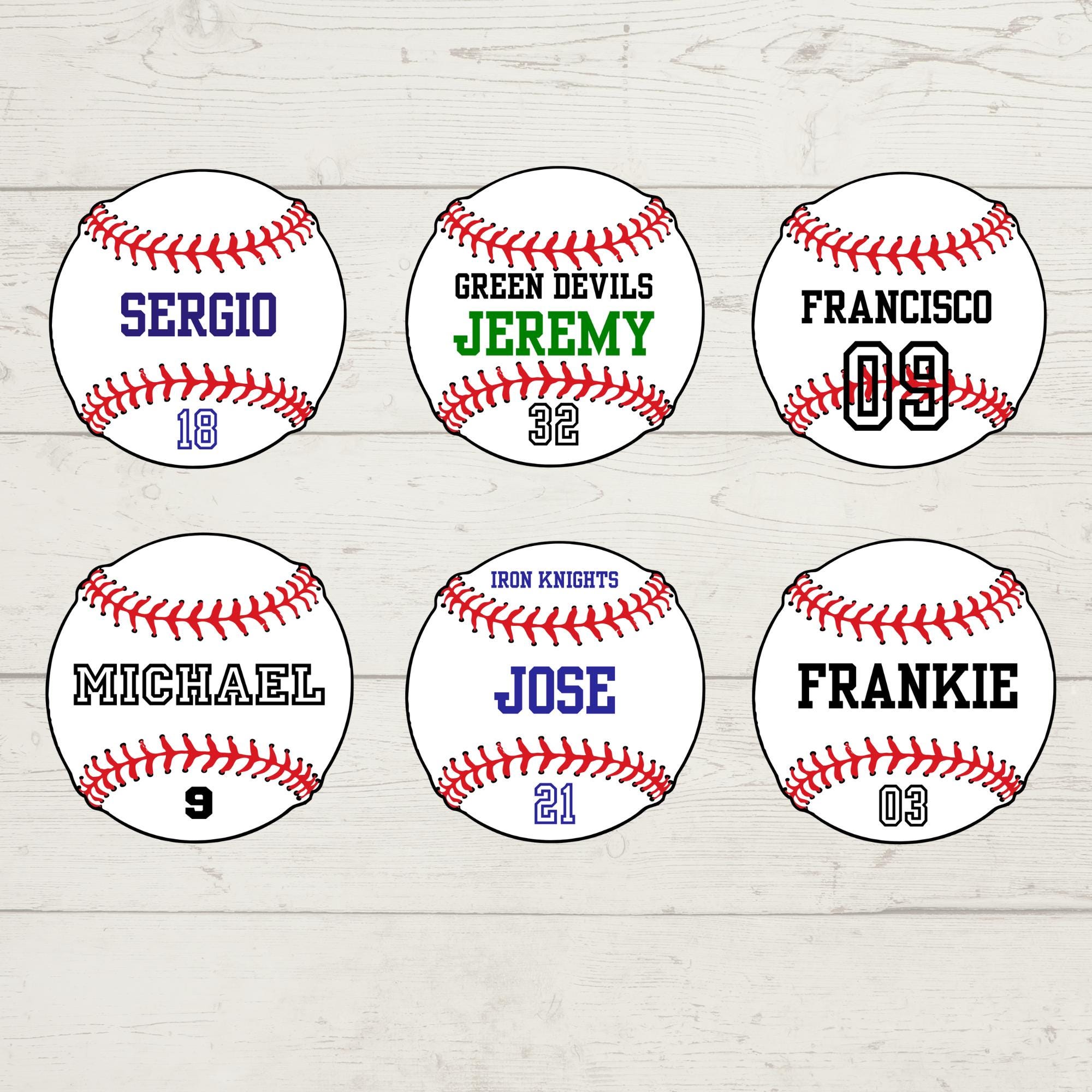 Six baseballs with personalized names and numbers on a light wood background