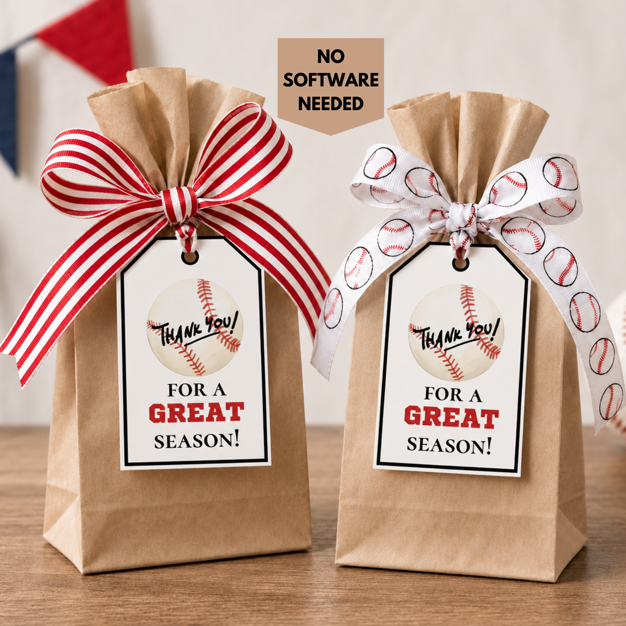 Two brown paper bags with baseball-themed ribbons and tags on a wooden surface.